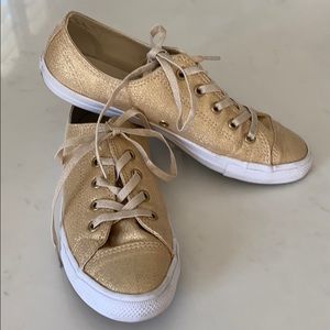Converse tennis shoes gold